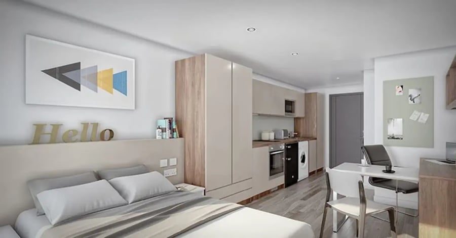 Bed kitchen desk and picture wall studio apartment at Trinity View Coventry in Coventry Student Accommodation